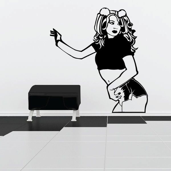 Wall decal of a woman with pigtails wearing headphones and short shorts