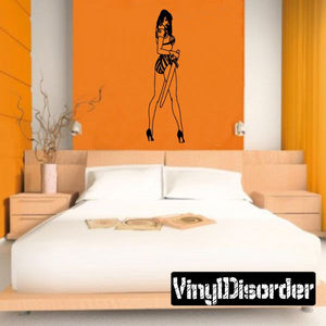 Woman silhouette wall decal with striped armor pattern, long dress and boots