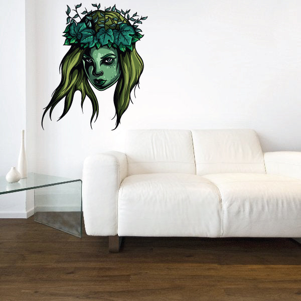 Wood nymph head sticker with green leafy crown and dark hair illustration