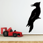 Woodpecker turning head decal with a black bird silhouette