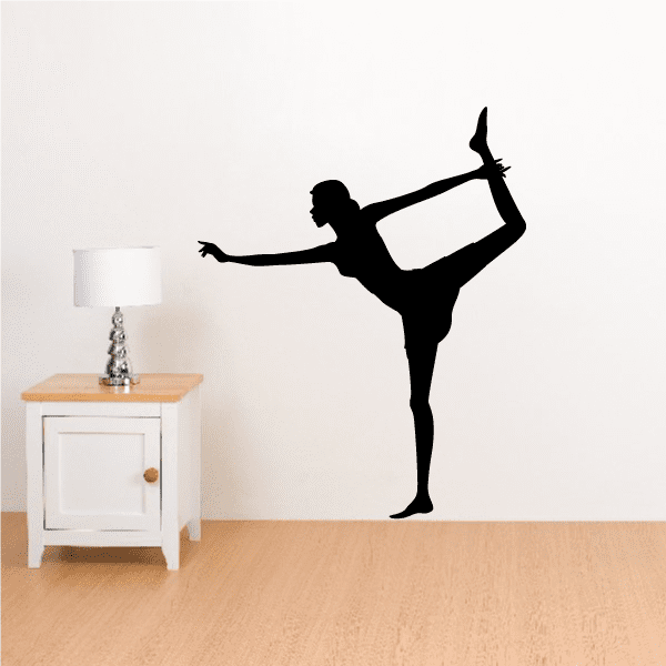 Black yoga wall decal of a woman in warrior pose