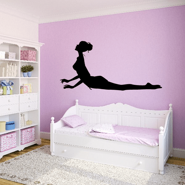 Yoga wall decal with black silhouette of stretching pose on wall