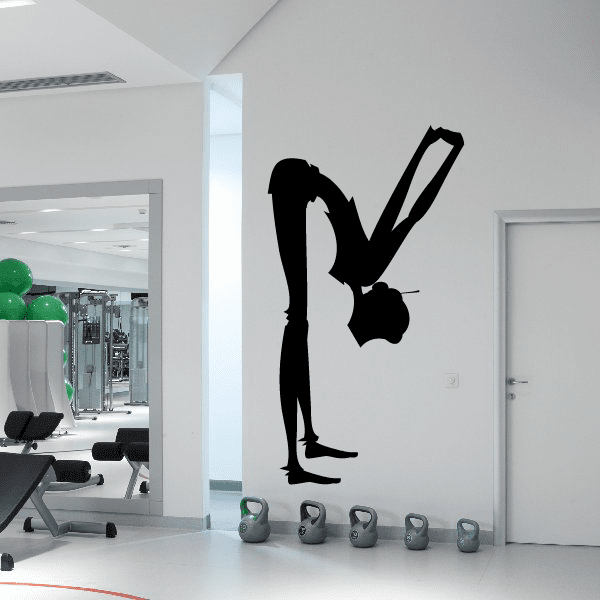 Yoga wall decal with standing figure silhouette and lifting icon in black