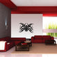 Tribal spider decal with black arachnid design on a light background