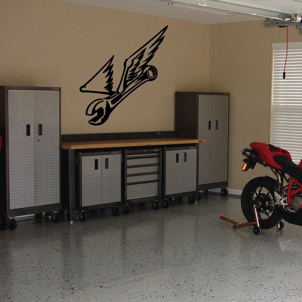Black wrench with wings decal with crossed wing tips and tool head line art