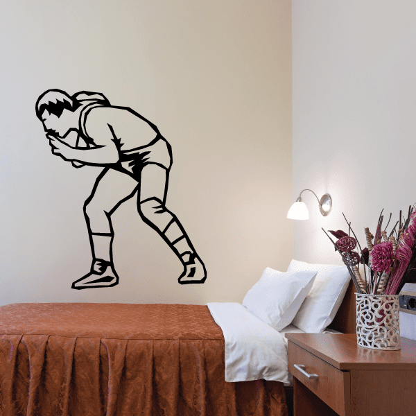 Wrestling wall decal of a black-outlined wrestler in a bent forward stance