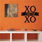 Valentine's Day wall decal with black XO and 'I love you' ribbon text