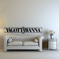 Decorative wall decal, black ornate lettering reading Yagottawanna