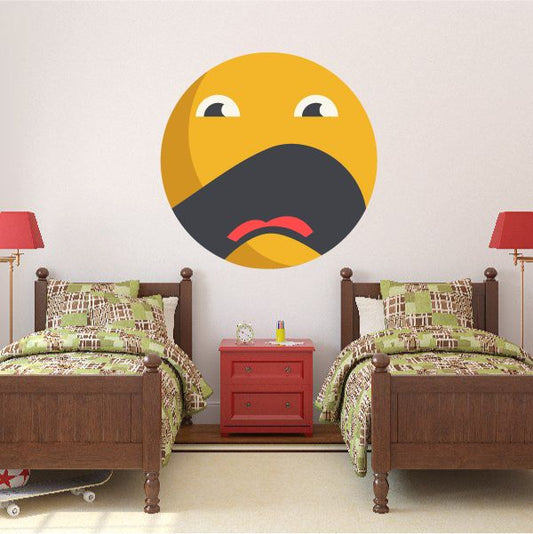 Yellow emoticon face wall decal with black mouth and red open tongue
