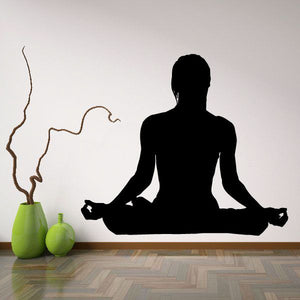Yoga meditation decal with seated cross-legged figure and flowing line outline