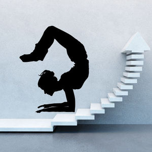 Black yoga pose vinyl wall decal with arms behind head, kneeling silhouette
