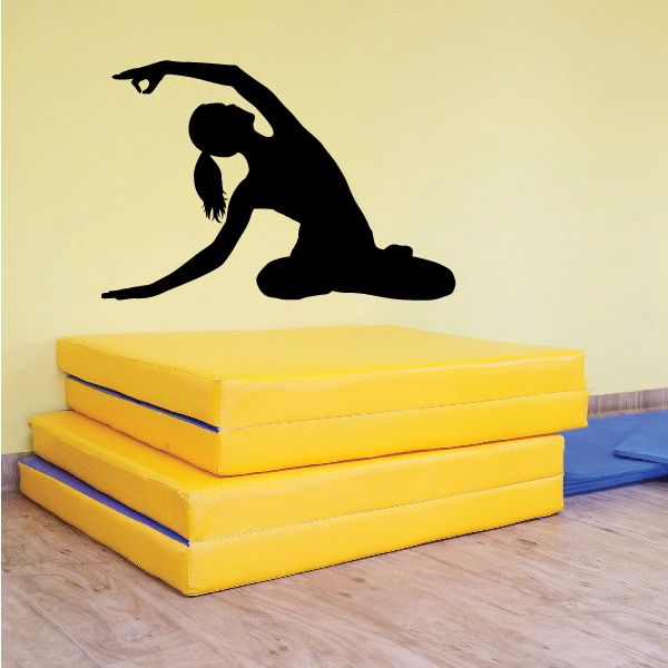 Yoga pose vinyl wall decal, black seated figure with arm extended