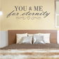 Wall decal reading "YOU & ME for eternity" with heart accents.