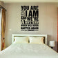 Wall quote decal with bold black text: “YOU ARE I AM AND WE’RE A MYSTERY”