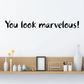Wall decal with black text: “You look marvelous!”