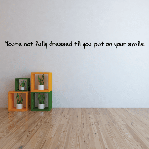 Image of You're not fully dressed til you put on your smile Wall Decal