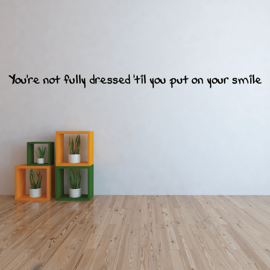 Image of You're not fully dressed til you put on your smile Wall Decal