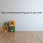 Wall decal with quote: “You're not fully dressed til you put on your smile”