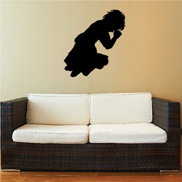 Praying girl wall decal, dark silhouette kneeling with hands clasped