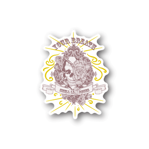 Vinyl sticker with white burst border, illustrated skull with roses and yellow swirls
