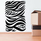 Zebra print wall decal with bold black and white striped face design