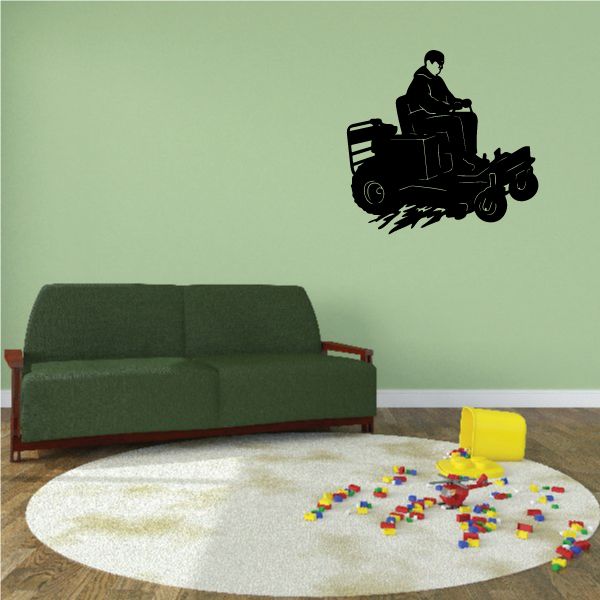 Black zero-turn lawnmower cutting grass decal silhouette