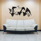Black zigzag dolphin wall decal with curved tail and fins