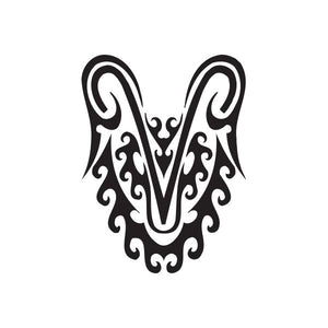 Black stylized Capricorn head decal with white accents and scrolling details