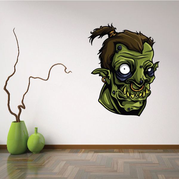 Zombie orc head decal with green skin, dark hair, and wide white eyes