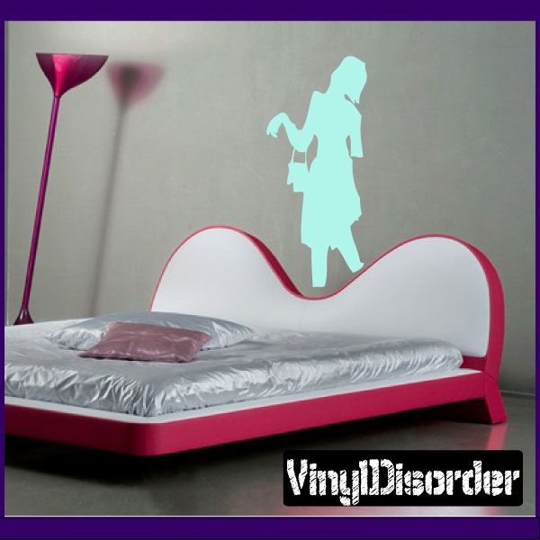 Zombie with purse wall decal, mint-green silhouette holding a purse near bed edge