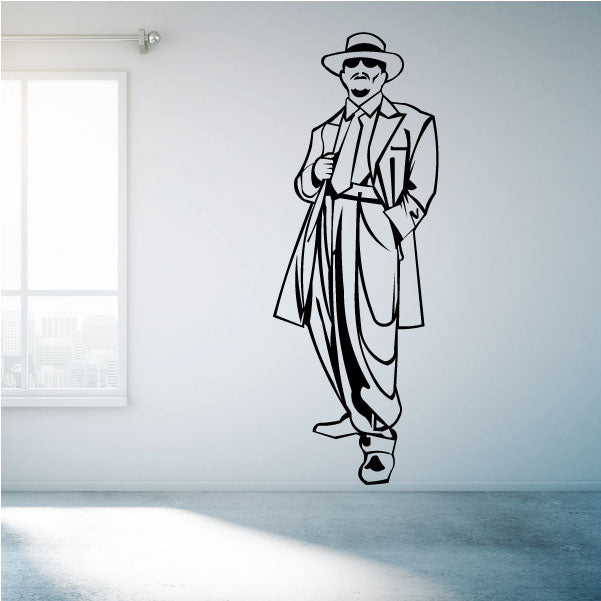 Car window vinyl decal of a cartoon man in a pinstripe suit and hat, black