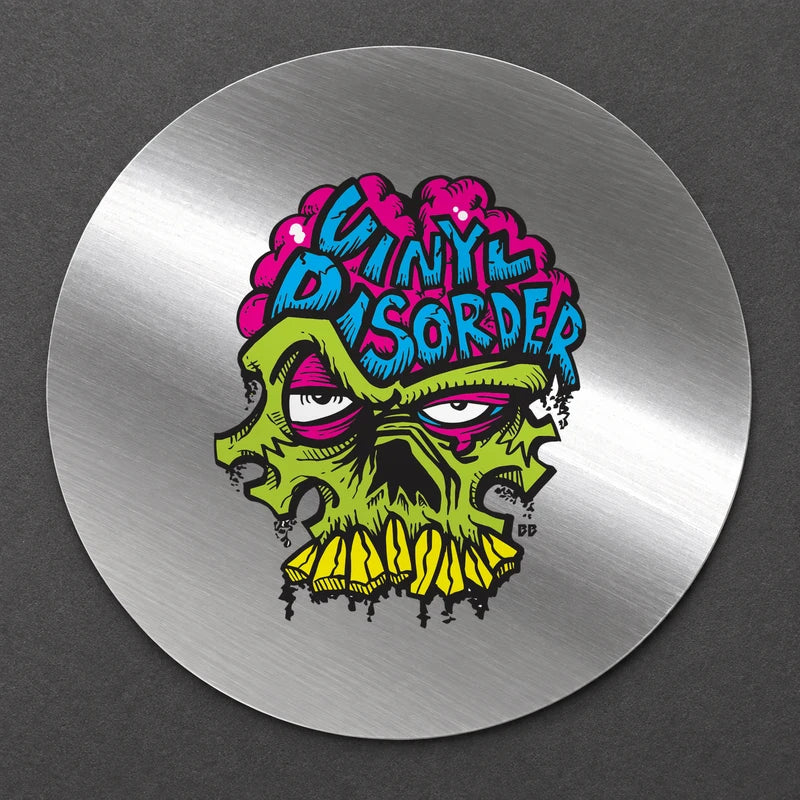 Reference-based render of the authentic Vinyl Disorder skull printed on Brushed Aluminum Chrome.