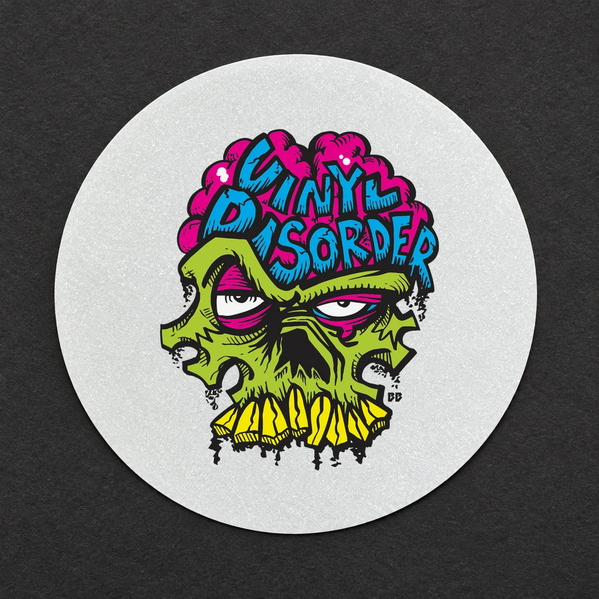Reference-based render of the authentic Vinyl Disorder skull printed on Reflective Vinyl, shown in ambient light.