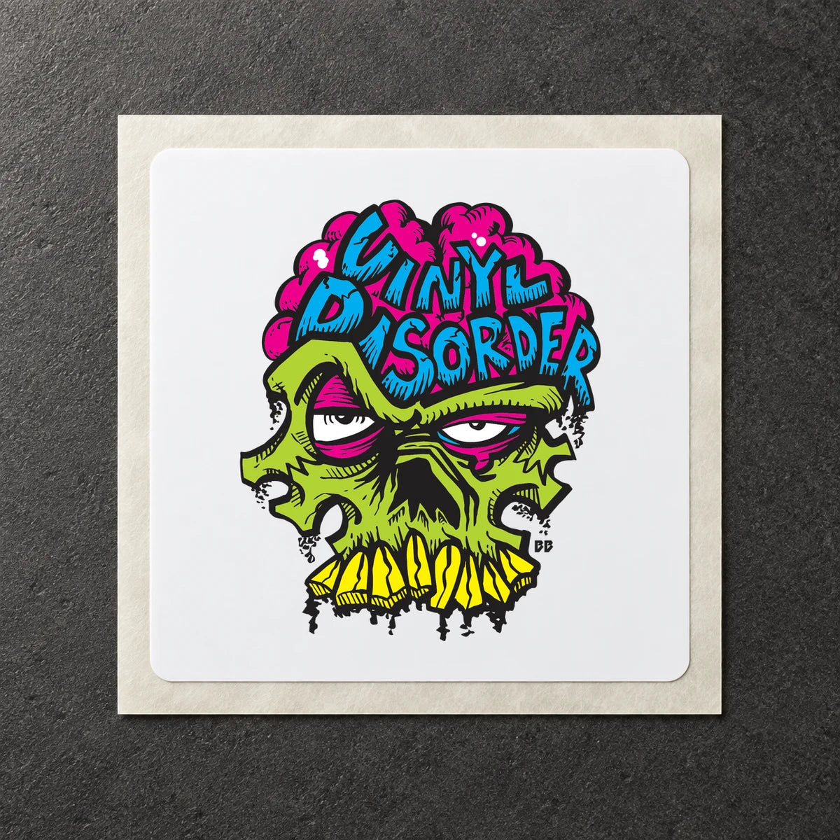 Authentic Vinyl Disorder skull printed on a white vinyl sample.